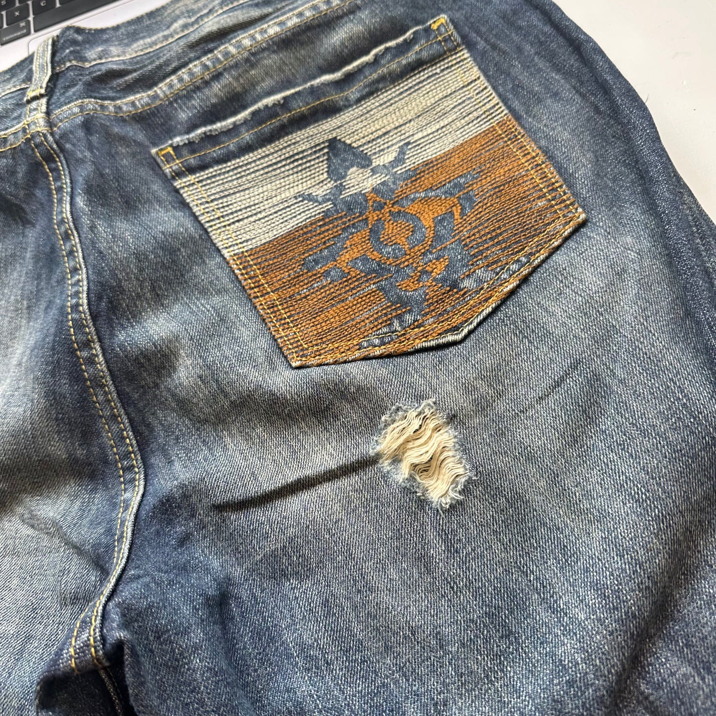 distressed skater jeans with embroidery